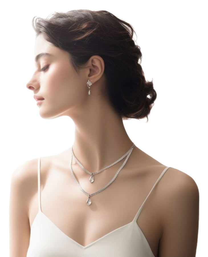 Model wearing layered diamond necklaces