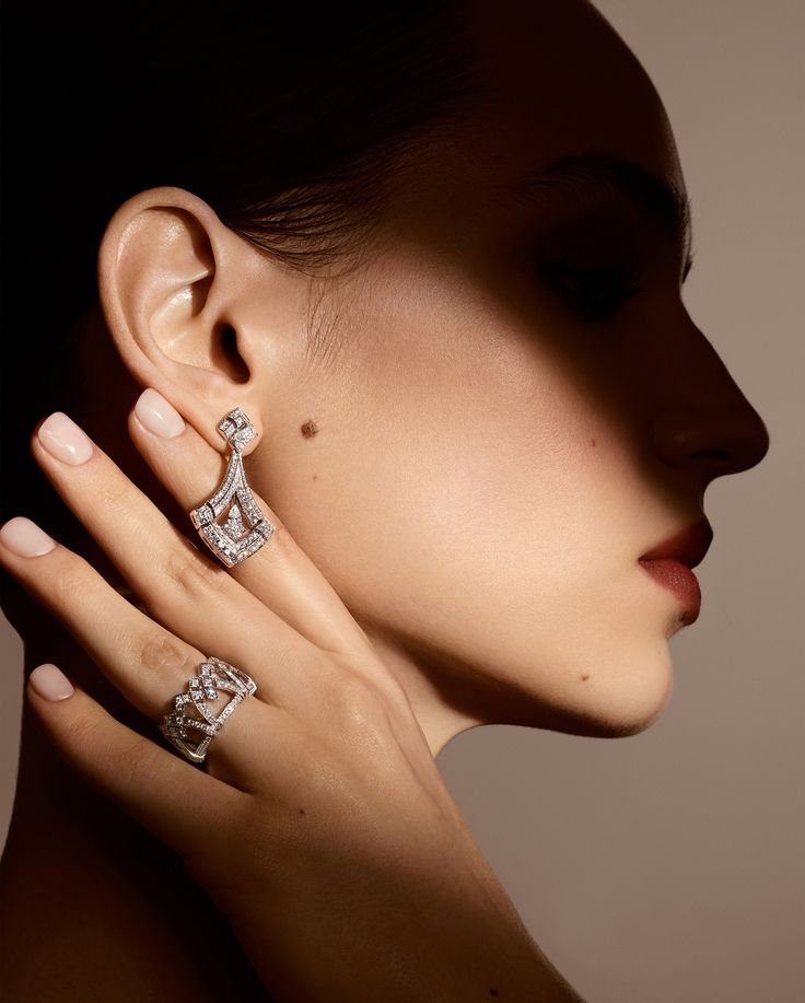 Model wearing statement rings